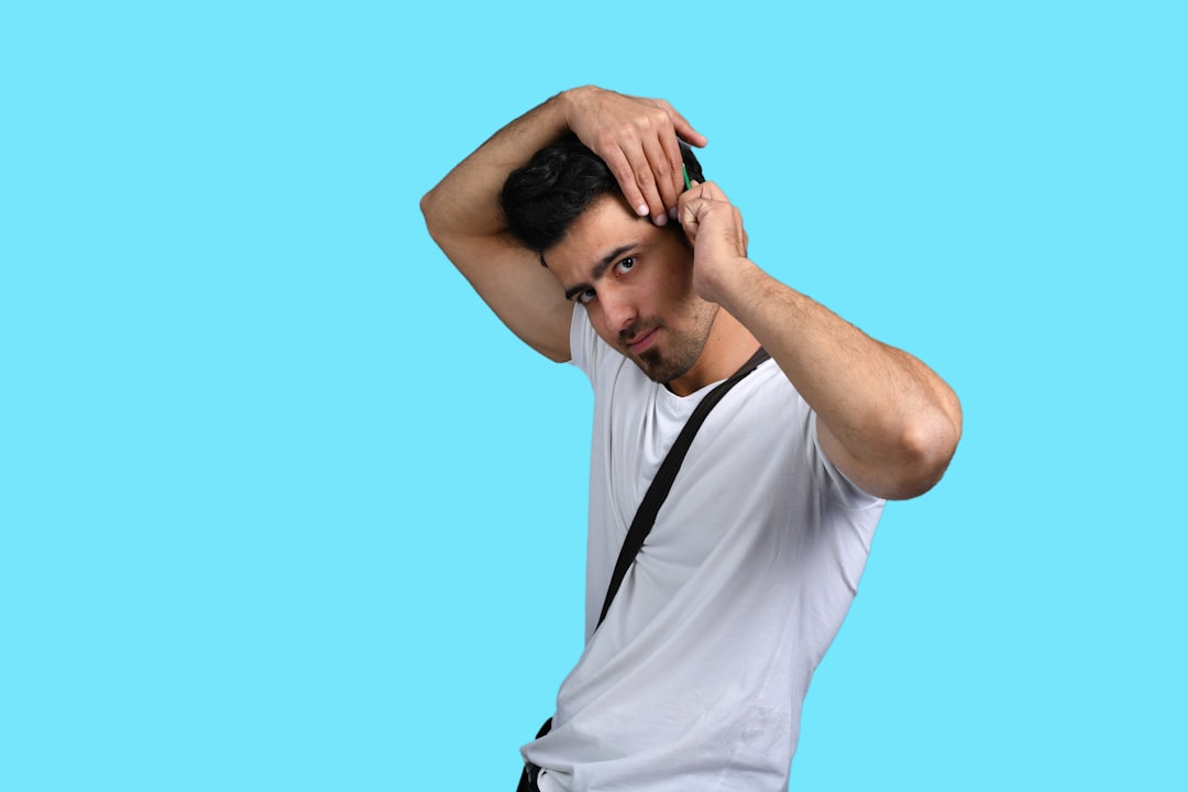 a man holding his hair