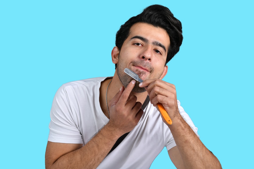 a man holding a drill