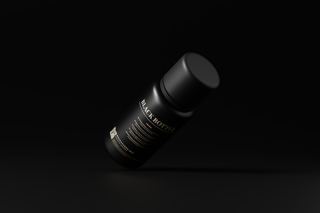 a bottle of perfume sitting on top of a table