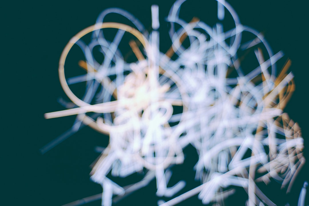 a close up of a clock with a blurry background