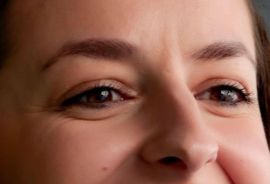A close up of a person brushing their teeth