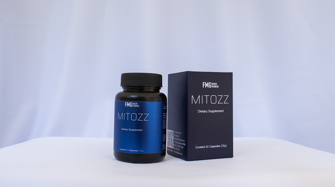 Bottle and box of mitozz dietary supplement