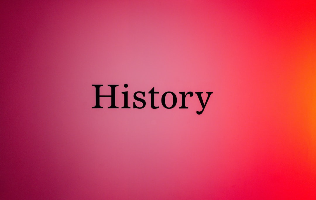 The word history on a pink and orange gradient background