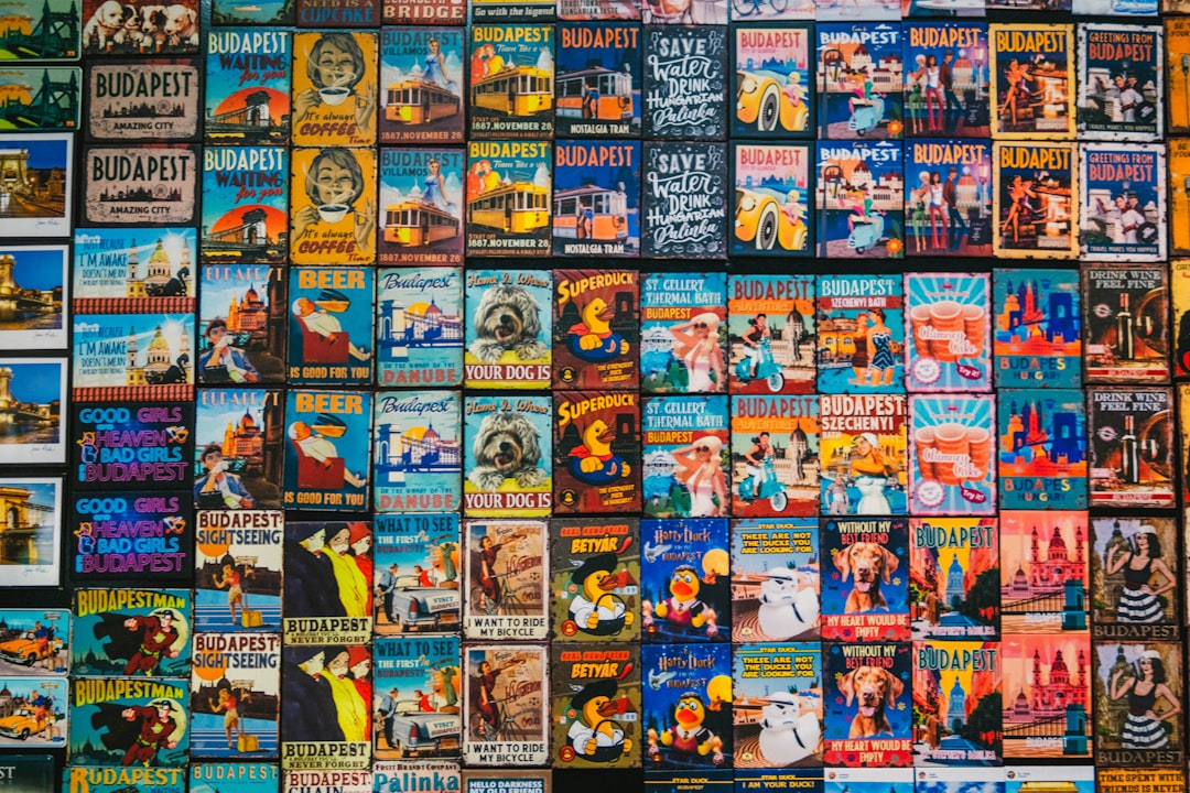 A large number of posters on a wall