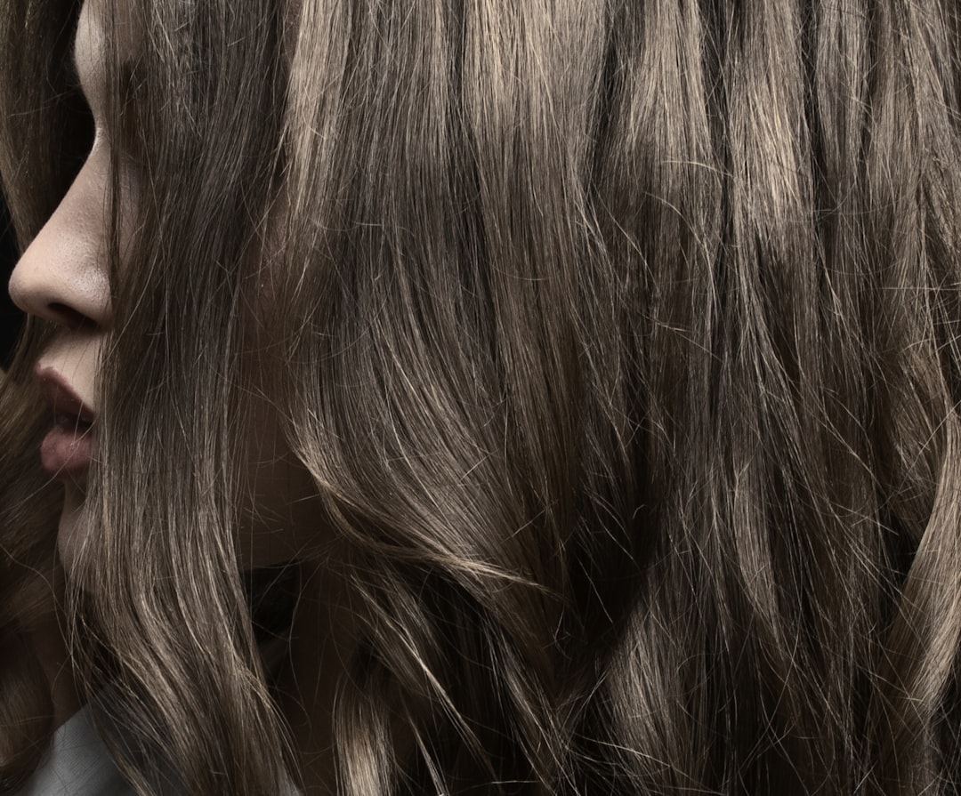 a close up of a person with long hair